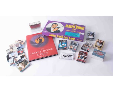 James Bond collectables including various packets of playing cards (6), unopened pack of 40th Anniversary trading cards, Die 