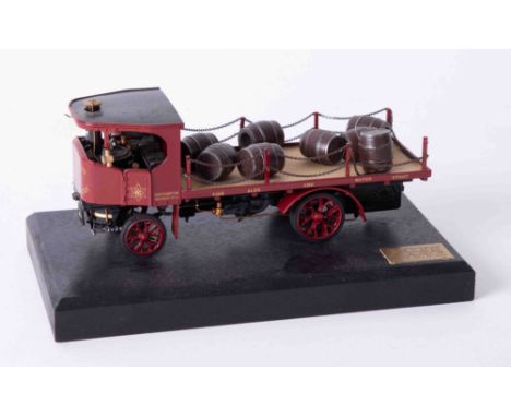 A Bassett Lowke precision scale white metal model of a flatbed Brewery Lorry, on stand, length 16cm, 41/2000 with certificate