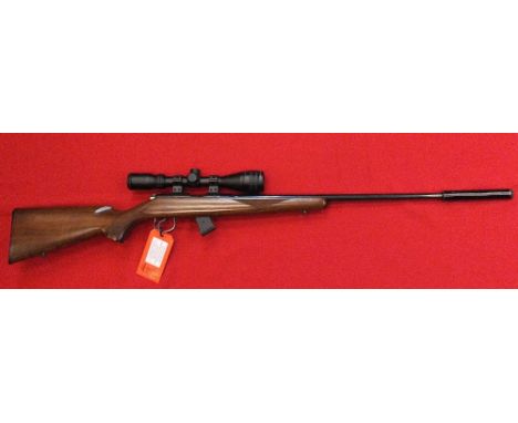 A .22 LR bolt action rifle by BRNO, this 'left handed' example is in excellent condition and is complete with a Hawke 3-4x40 