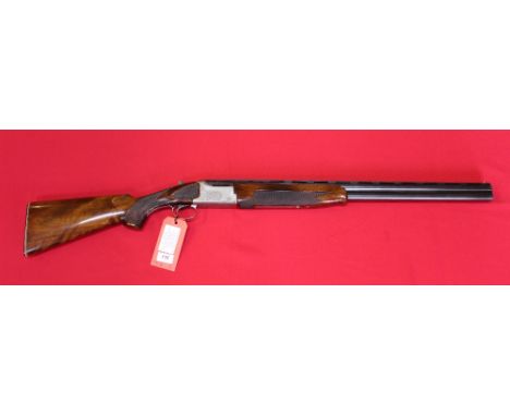 A Winchester O/U shotgun with 27" barrels with excellent bores, S/No.PK402362, top rib marked Pigeon Grade, in overall excell