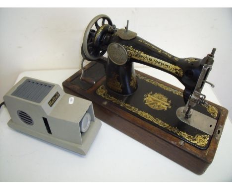 Oak cased Singer sewing machine and a vintage Halina 150 Projector (2) 