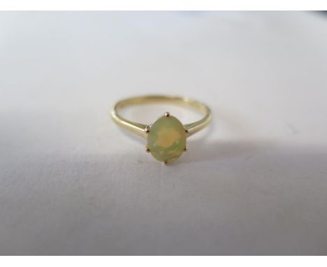 A 9ct ring set with an opal stone, size Q, approx 1.7 grams, in good condition 