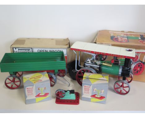 A collection of Mamod steam related items, a Mamod steam tractor with original box, a Mamod Open wagon with original Box and 