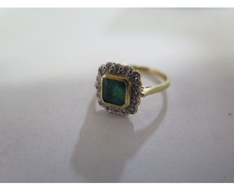 An 18ct yellow gold emerald and diamond ring - size K/L - approx 5mm x 5mm - general usage consistent with age - hallmarks ru