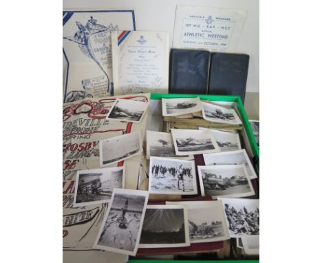 A collection WW2 photographs and diaries with other ephemera from around that era, including over 30 photographs of damaged v