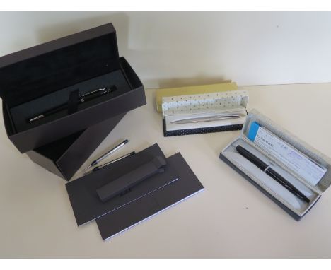 A Dunhill ballpoint pen with box and papers together with two Parker pens, see images for details 