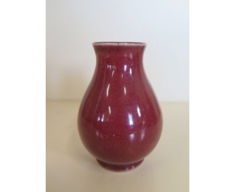 A small Moorcroft experimental stoneware sang de boeuf vase,  approximately 9 cm high, with Moorcroft stamp to base with some