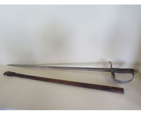 A Victorian British Officers Sword - with leather scabbard, blade length 82cm - worm and wear to hilt, blade appears polished