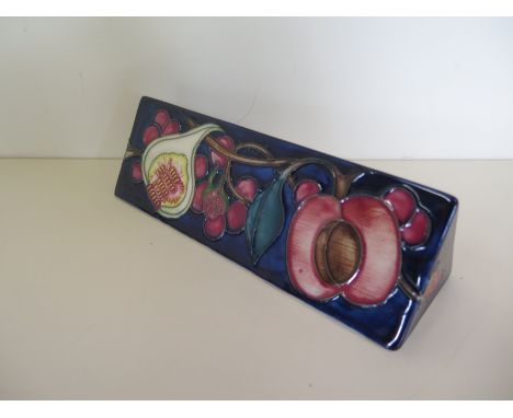 A Moorcroft Toblerone by Wendy Mason - 19cm long, has silver line but good condition 
