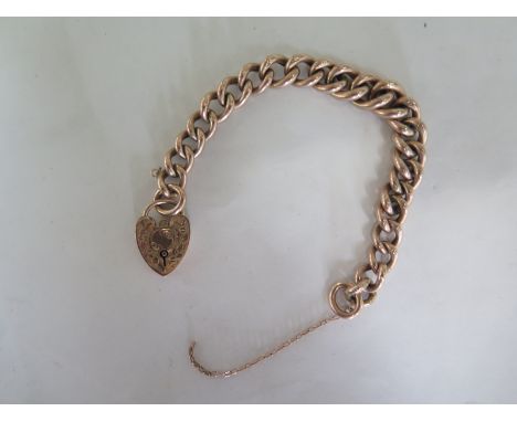 A 9ct gold bracelet, some wear, chain broken, approx 17 grams 