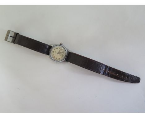 A Solar Oyster style gents wristwatch- manual wind - 30mm wide including button - running - wear consistent with age 