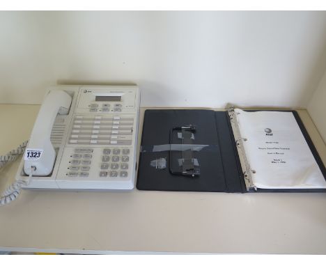 An AT&T secure voice/data terminal telephone, model 4100, issue date 1992 - with manual , good film prop. 