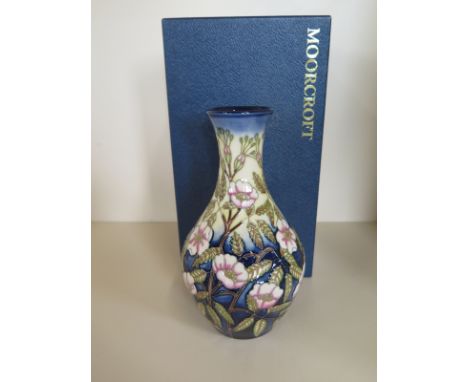 A Moorcroft Dog roses vase by CE Sneyd - signed no 34 of 75 - boxed, good condition 