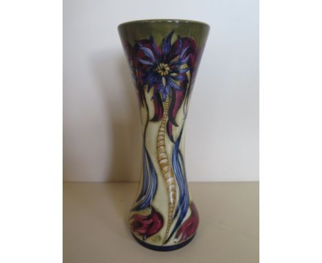 A 2004 Black Ryden trial vase, approximately 24 cm high, with some flaws to glaze, with Moorcroft box 