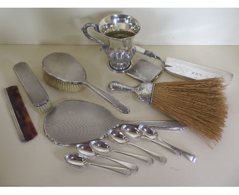 Six HM silver teaspoons, approximately 3.5toz together with a silver handled brush, four silver backed dressing table wares, 