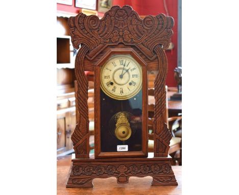 An American gingerbread mantel clock, c.1900