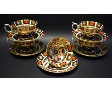 A set of five Royal Crown Derby 1128 Imari tea cups and saucers, second quality 