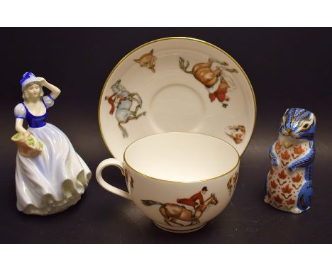 A Royal Crown Derby paperweight, Chipmunk; a Royal Worcester breakfast cup and saucer printed with hunting scenes; a Coalport