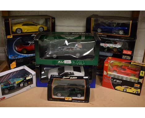 An Auto Art Aston Martin DB5 die-cast 1:18 scale model; others; a Lotus Esprit Turbo; a Lamborghini Diablo; a Jaguar XK8; a S