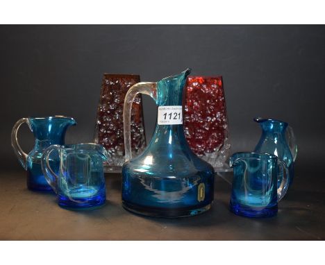 A pair of Whitfriars glass ruby red coffin vase, bark textured principle sides; a blue jug; others smaller (7)