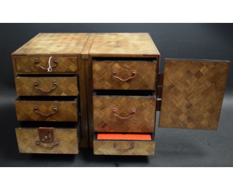 A Japanese Parquet veneered fruit wood two section table top cabinet, composed of single door section, fitted with two gradua