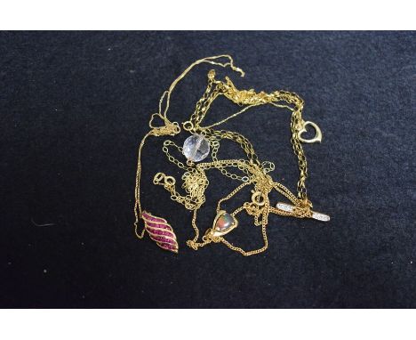 A ruby leaf droplet pendant necklace, 9ct gold mount and chain;  others, crystal, etc, 11.7g gross