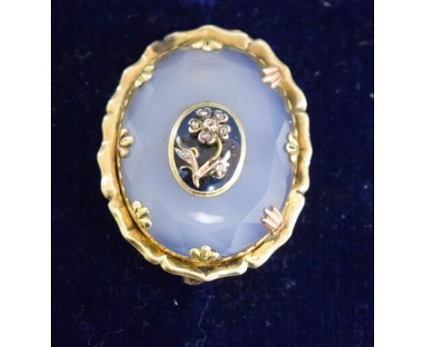 A Victorian gold framed milky agate brooch, centre with diamond set flower on enamel panel, boxed