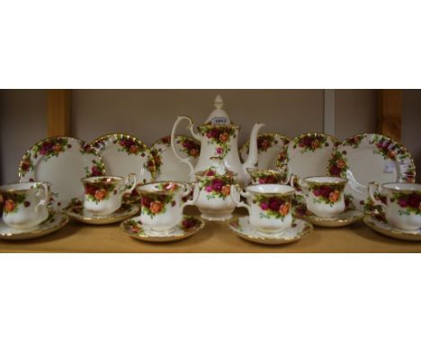 A Royal Albert Old Country Roses service for six, comprising coffee pot, demitasse cups and saucers, side plates, creamer, su