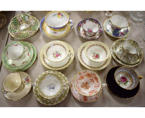 A late 19th century Davenport teacup and saucer, printed and painted with floral sprays; other English Staffordshire teacups 