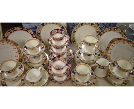 A Royal Albert tea service, comprising cups, saucers, sugar bowl, etc., decorated in the Imari pallet, printed marks; etc.