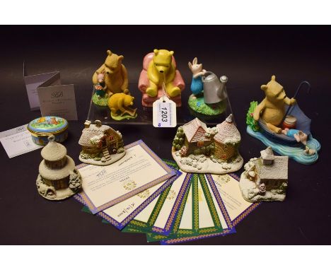 A Royal Doulton Winnie the Pooh in the armchair; other Border Fine Arts similar; an enamel Winnie the Pooh box; Lilliput Lane