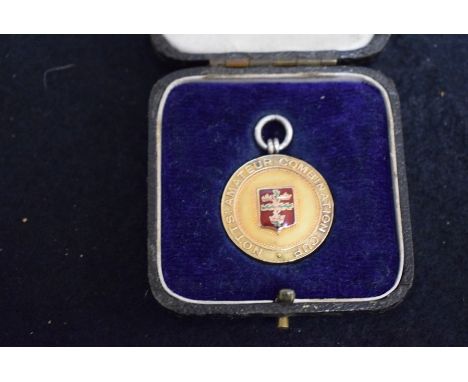 A gold fronted and enamel silver fob, Nottingham Amateur Combination Cup