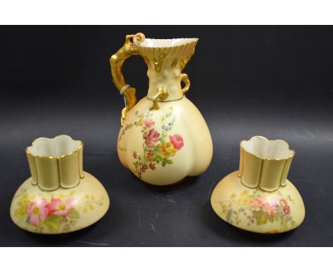 A Royal Worcester blush ivory ewer, branch handle, decorated with flowers, printed mark; a pair of similar squat vases (3)