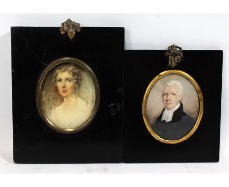 An early 20th century ivory portrait miniature depicting a woman wearing diamond earrings, signed Beatrice Wainwright lower r