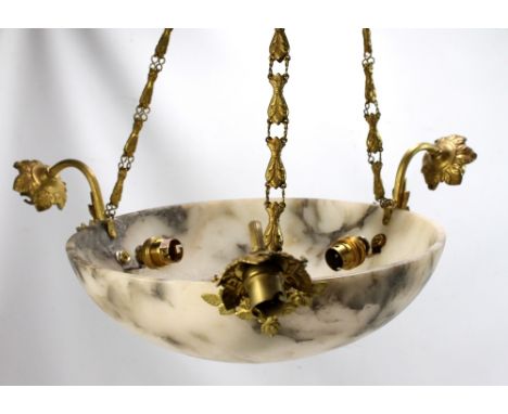 A ceiling light with gilt metal fittings and onyx shade, diameter 35.5cm.
