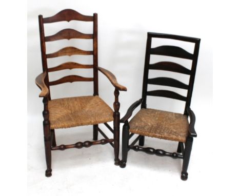 Two similar 19th century ash and elm rush seated ladder back elbow chairs and a similar lower example (3).