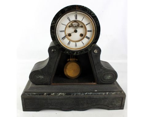 A late 19th century French black slate and green marble detailed mantel clock, the two-piece white enamel dial set with Roman