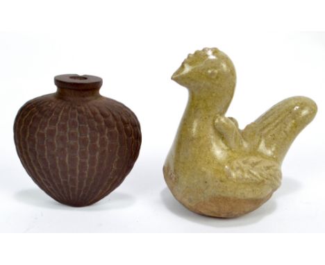 A Chinese ceramic snuff bottle of flat squat baluster form with textured body, height 4.5cm (af), and a possibly provincial c