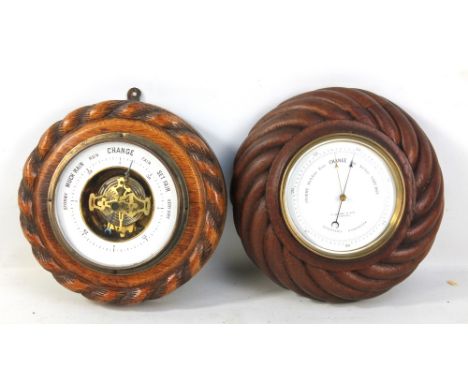 An early 20th century oak cased circular barometer, diameter 22.5cm, and a Holosteric barometer retailed by R Hornby &amp; So