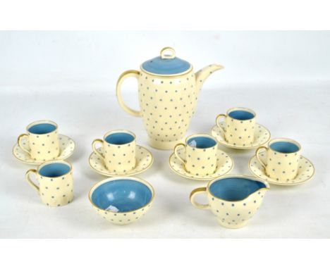 SUSIE COOPER; a six setting part coffee set comprising coffee pot, six coffee cans, five saucers, jug and bowl, each piece de