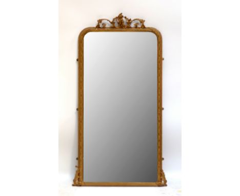 A large gilt framed mirror with moulded Cupid finial and foliate scrolling, approx 171 x 95.5cm (af).  CONDITION REPORT: Dama