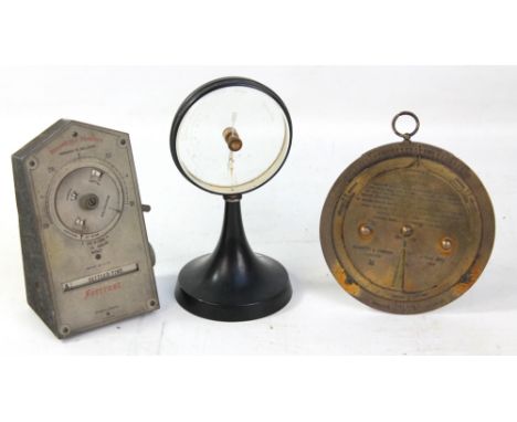 A circular glazed barometer on shaped stand inscribed 'CP Goerz, Berlin, Atmospheric Pressure Relative to Sea Level', height 
