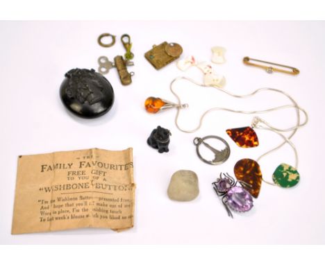 A 15ct yellow gold and diamond bar brooch, an amethyst set example in the form of a beetle, a 925 silver and amber necklace, 