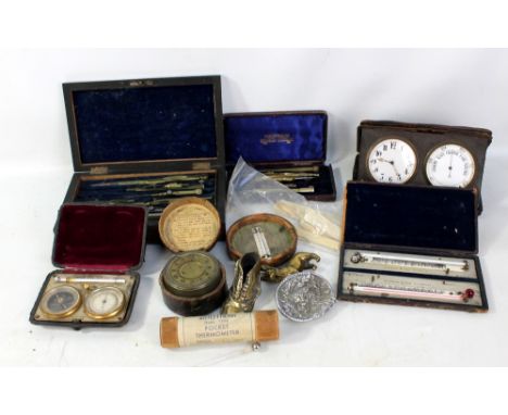A quantity of scientific instruments including part sets of drawing instruments, a cased compass thermometer and compensated 