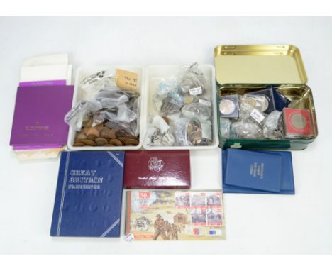 A collection of predominantly post-1947 British coinage to include commemorative crowns and Britain's first decimal coin sets