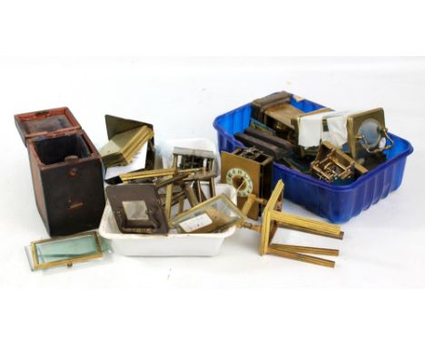 A quantity of carriage clock parts and spares including cases, dials, movements, travelling case, etc.