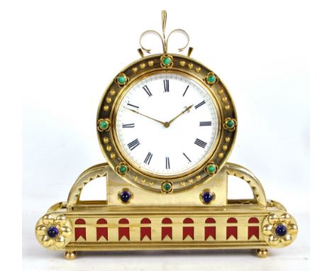 An elaborate late 19th century brass mantel clock with malachite and blue glass roundels, the white enamel dial set with Roma