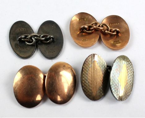 A pair of 9ct rose gold plain oval cufflinks, hallmarked for Birmingham 1921, approx 9.9g, and a further pair of engine turne