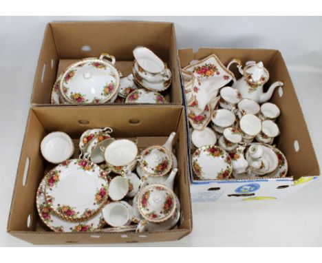 A Royal Albert 'Old Country Roses' tea and dinnerware, including two tureens (one cover missing, the other af), teapots, cups