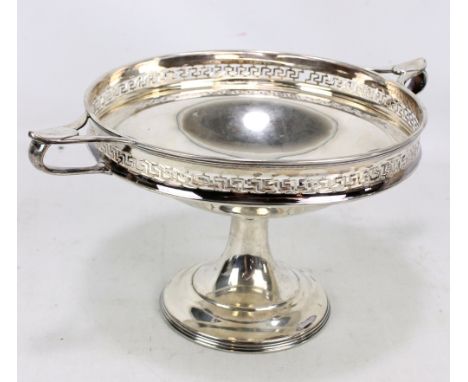 ATKIN BROS; a George V hallmarked silver twin handled comport with pierced Greek key sides, on spreading foot and base, Sheff